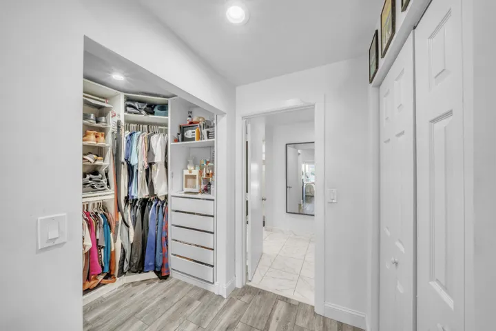 Walk-In Closet with Custom Shelving