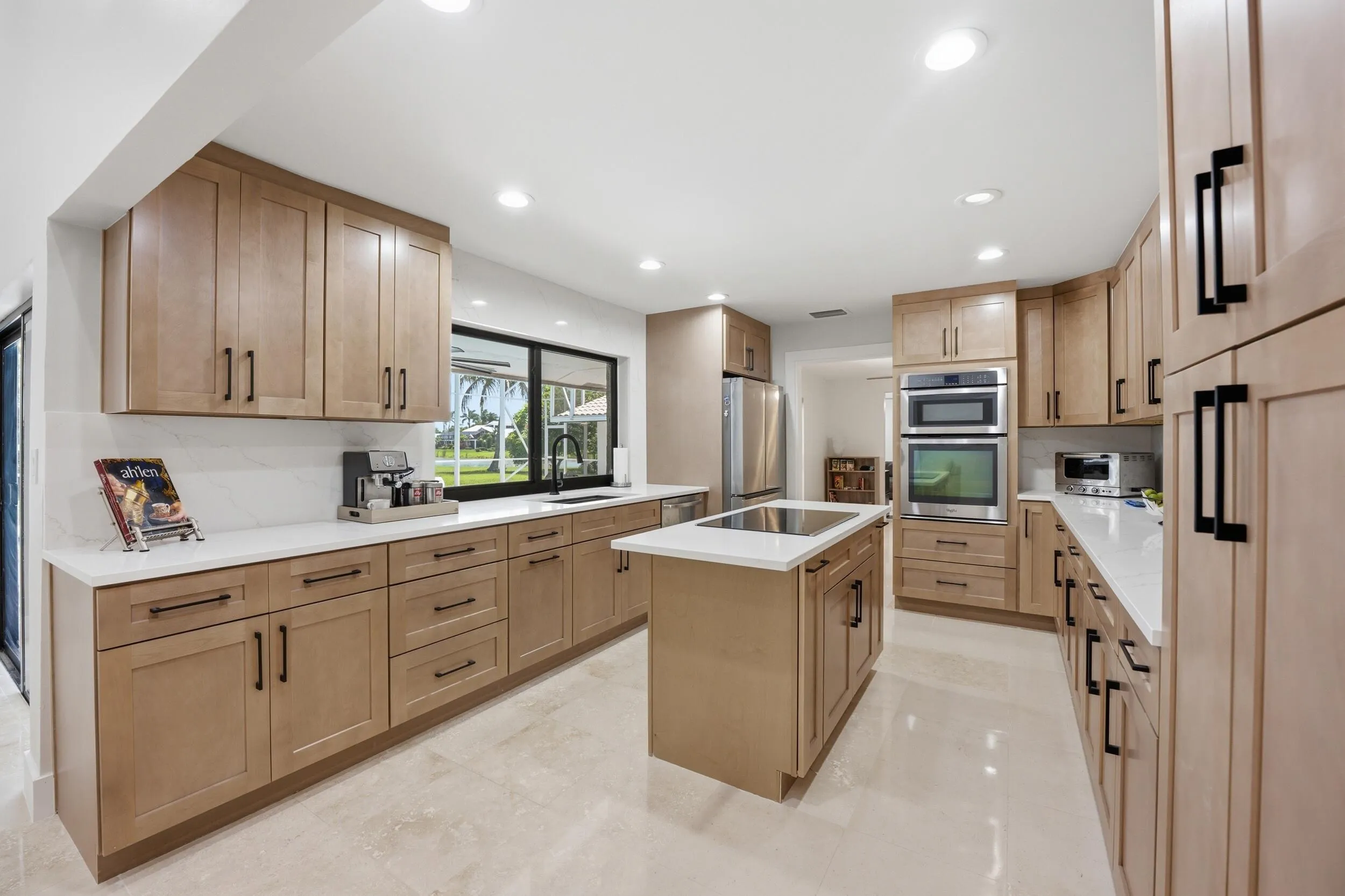 Upgraded kitchen Toffee Cabinets with Black Accents