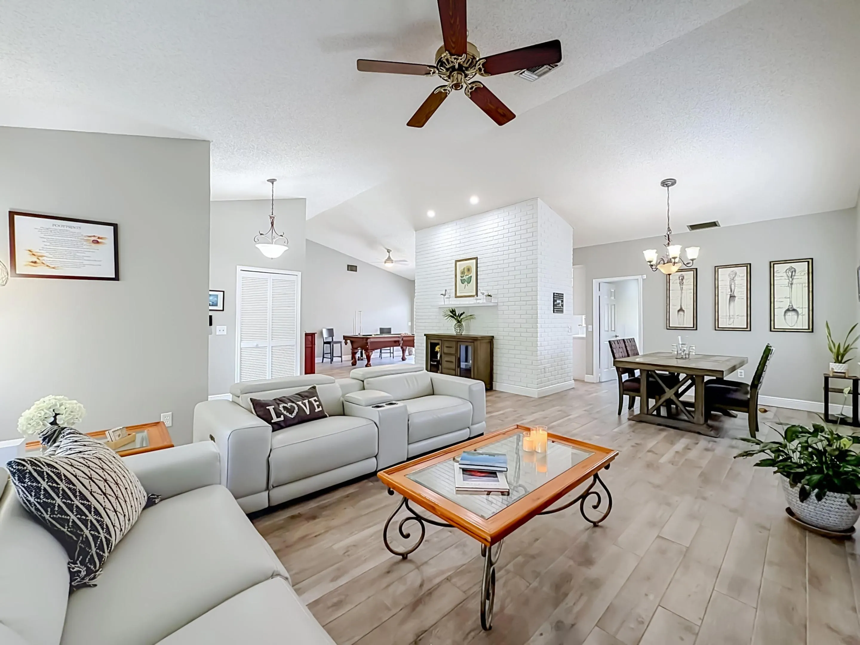 Living/family room with dining room, tile floors throughout,