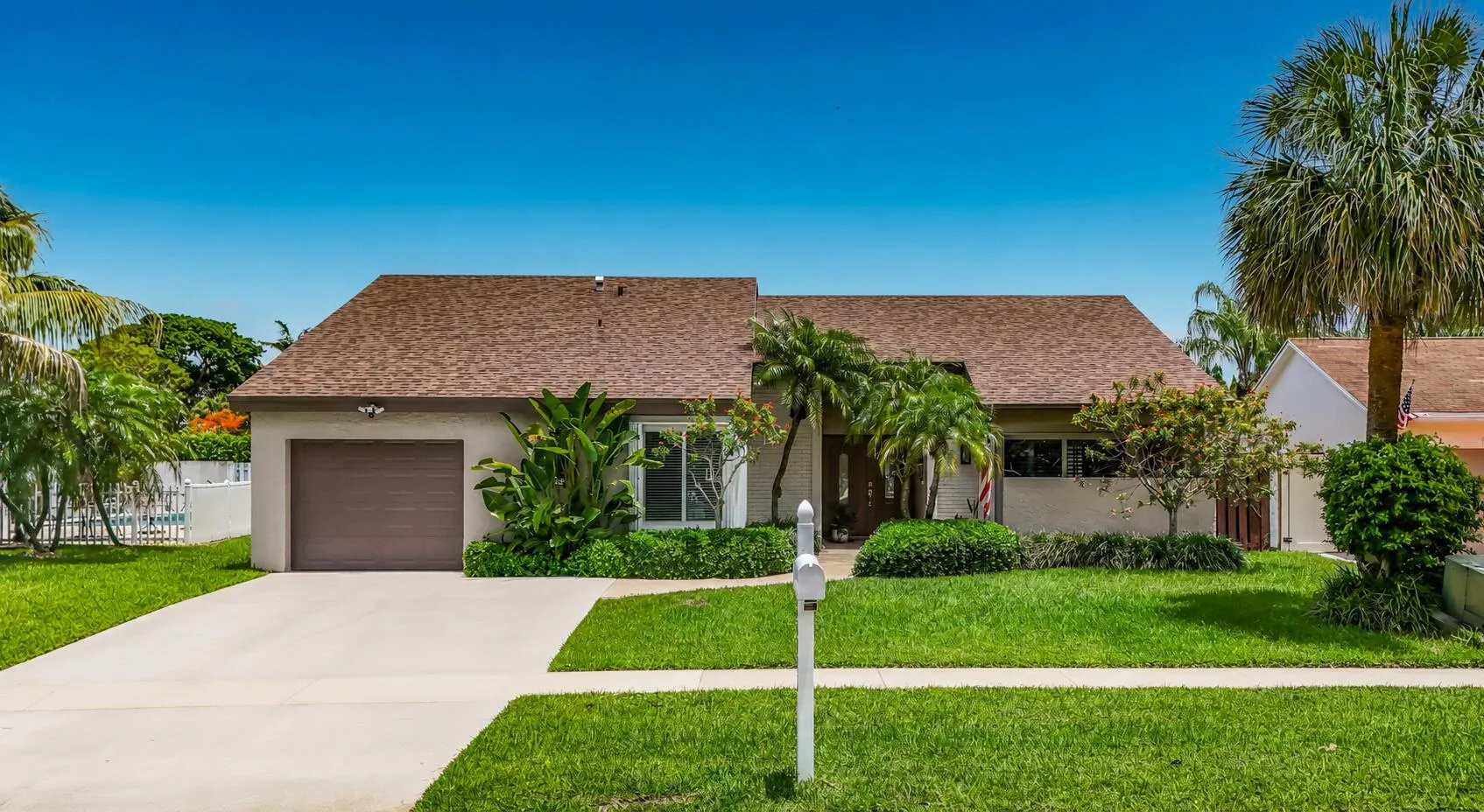 Front of home room for 4 cars in driveway, roof 2024