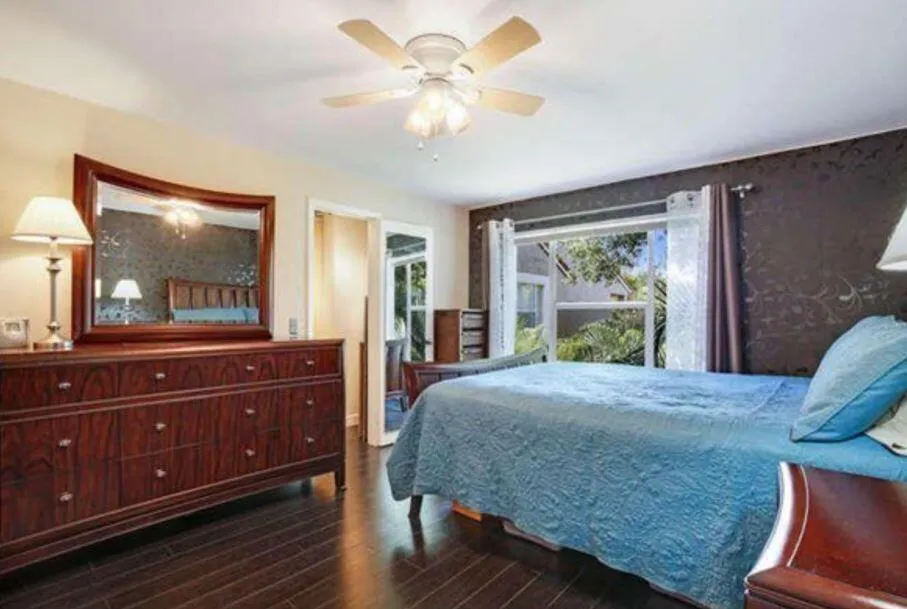 1745 Palm Cove 3 305 balcony bed 1