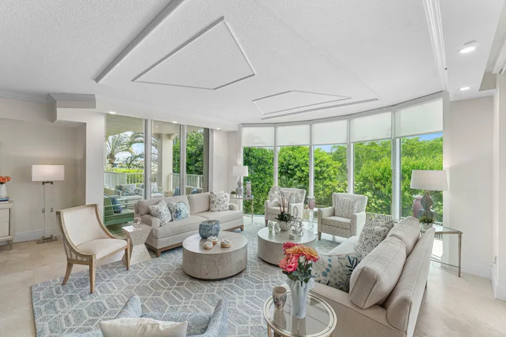 CUSTOM LIGHTING, 9 FT CEILINGS AND NEUTRAL MARBLE FLOORS