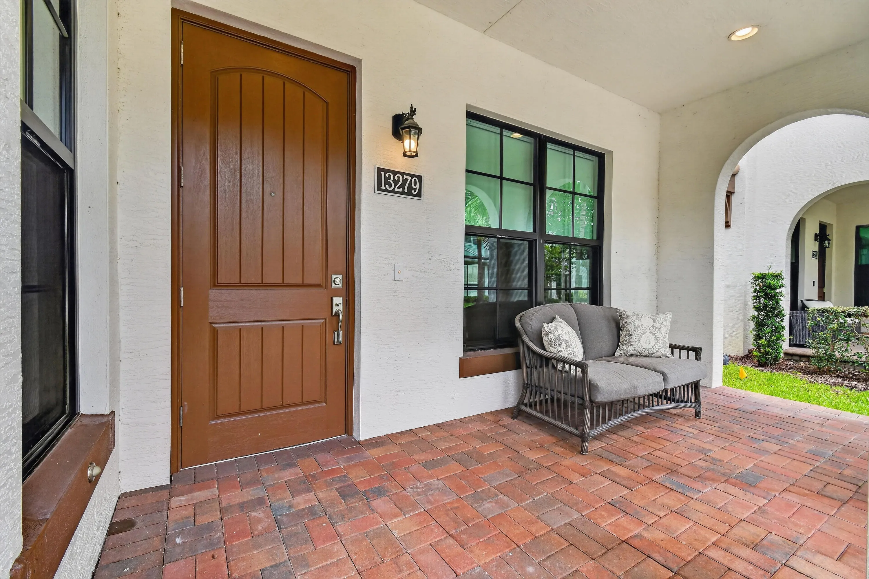 Inviting covered front porch creates a warm welcome.