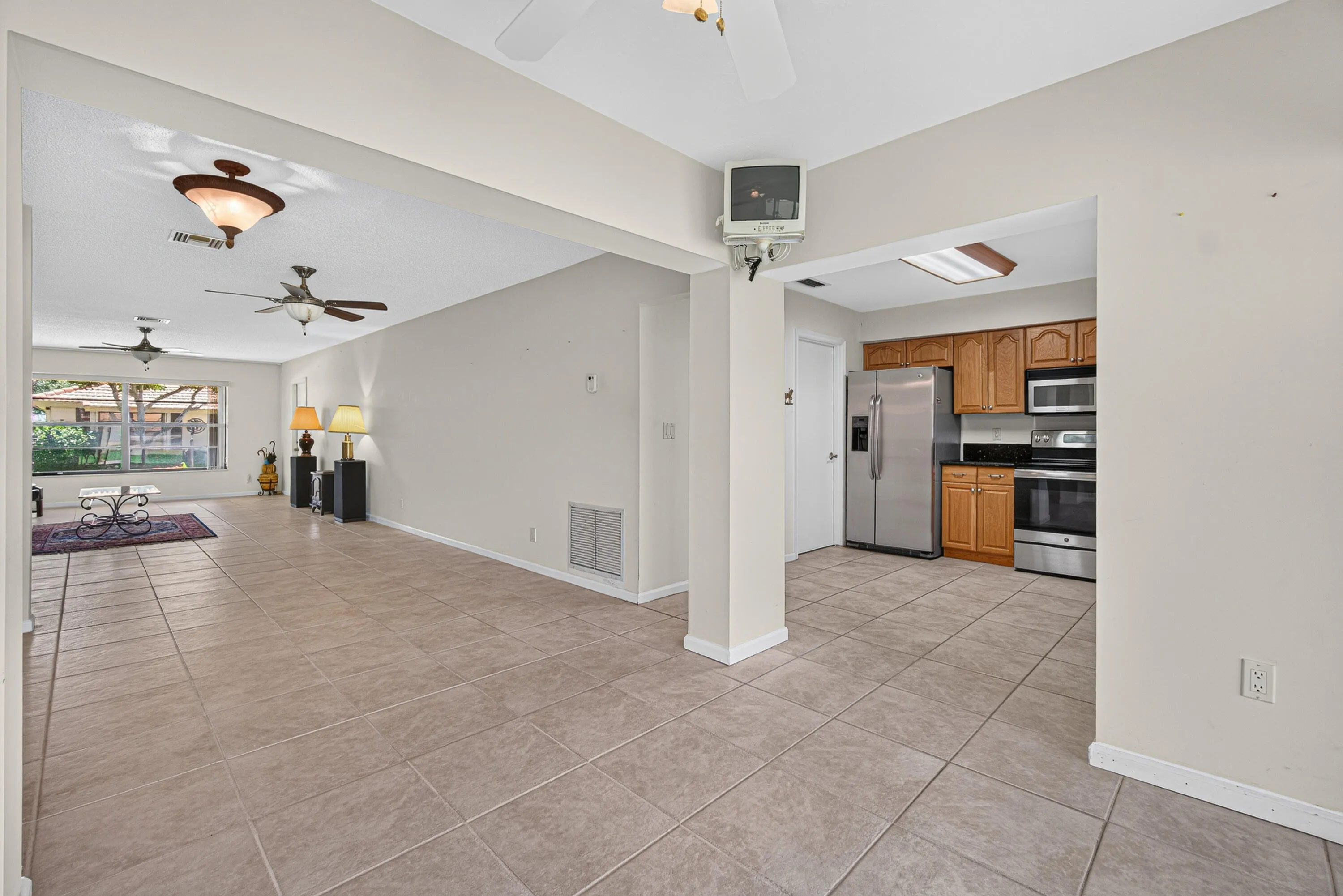 FLORIDA ROOM TO KITCHEN AND DINING ROOM