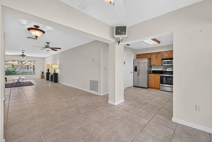 FLORIDA ROOM TO KITCHEN AND DINING ROOM