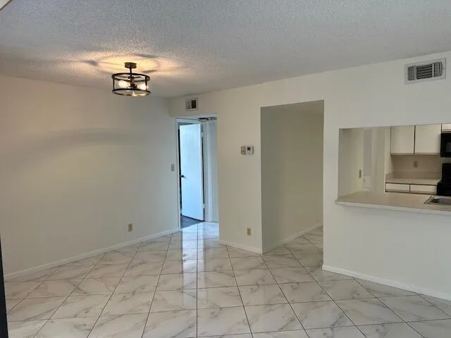 Dining/Kitchen and Entry to Master Suite