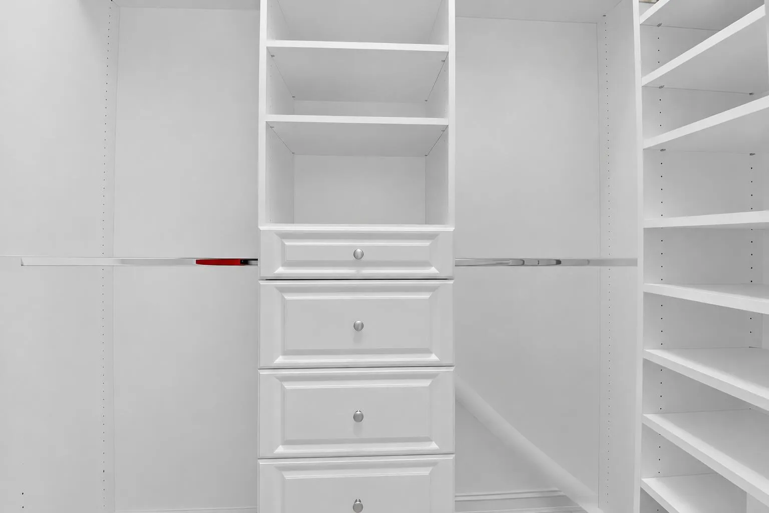 Primary Custom Built Walk-In Closet 2