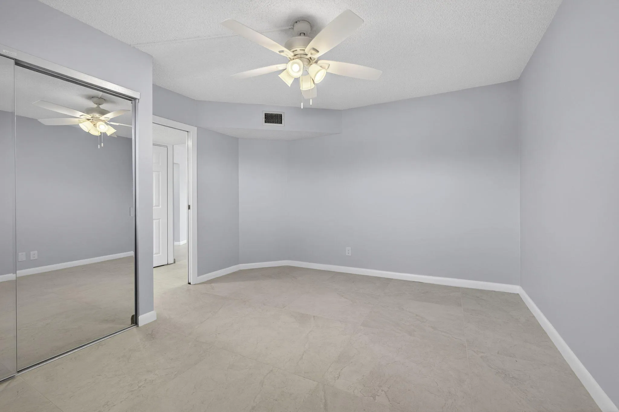 Guest bedroom with new closet doors