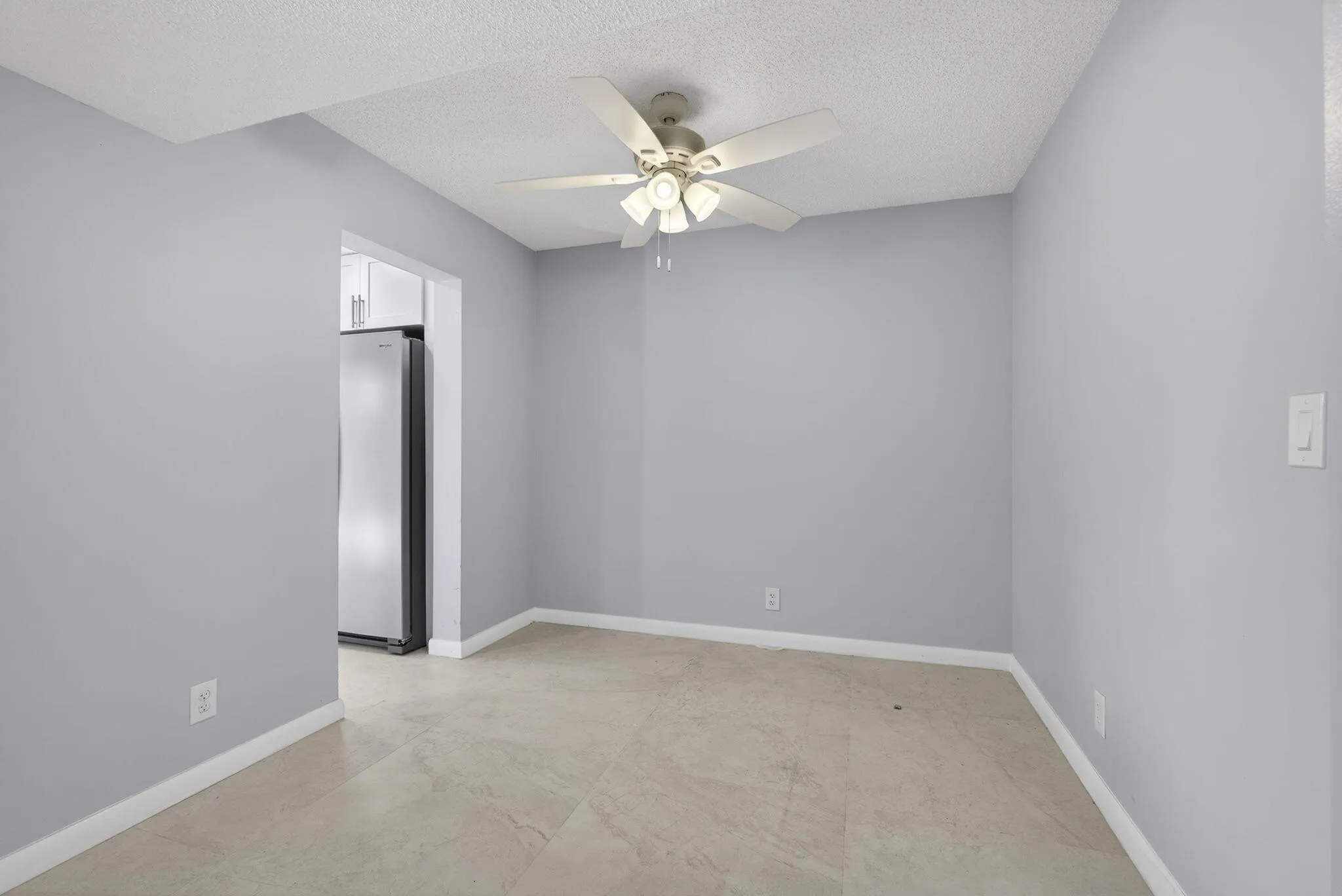 View of dining room area with new ceiling fan