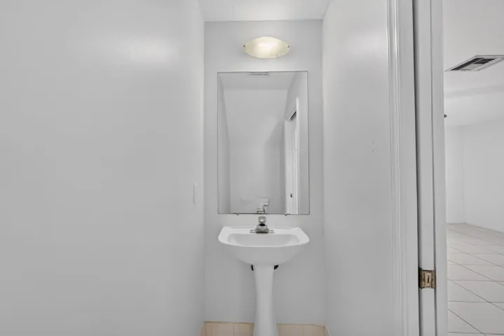 3RD BATHROOM HALF BATH DOWNSTAIRS