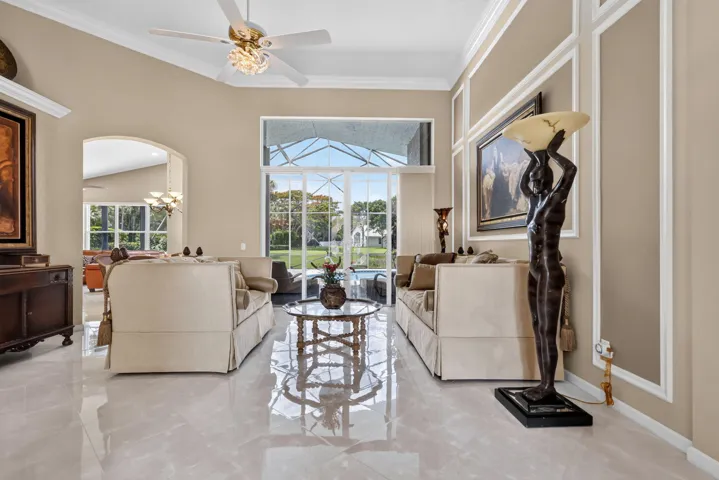 Lovely flooring throughout. The arches brings character & adds beauty to this lovely home.