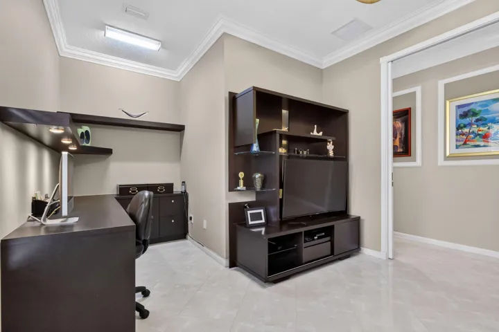 The alcove which can be a closet they are using for a desk for their den.