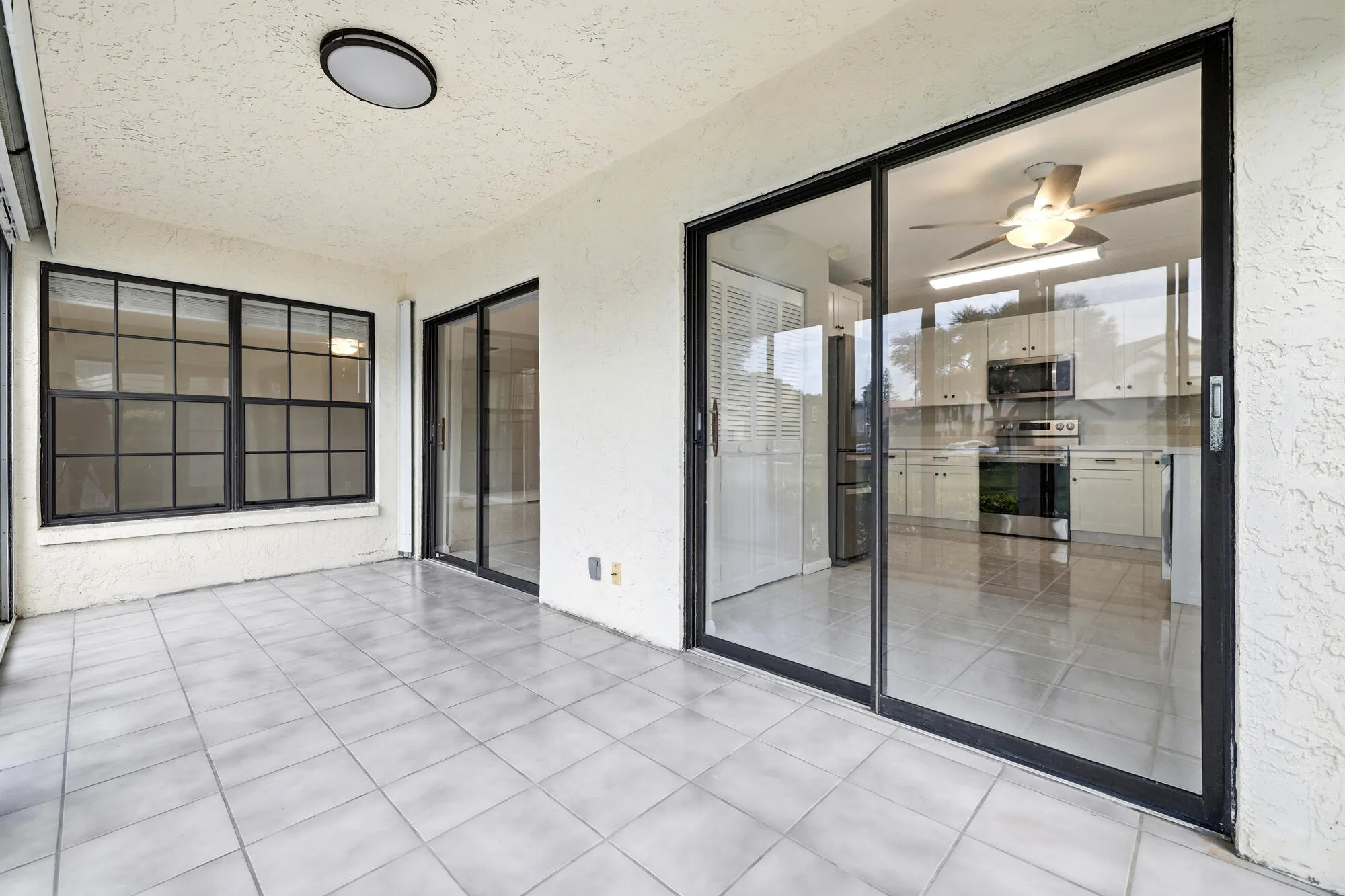 roof covered screened in peaceful patio