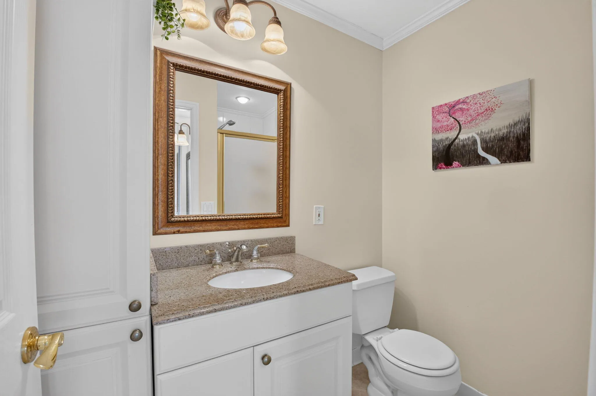 Second bathroom has custom built linen tower for towels and more!