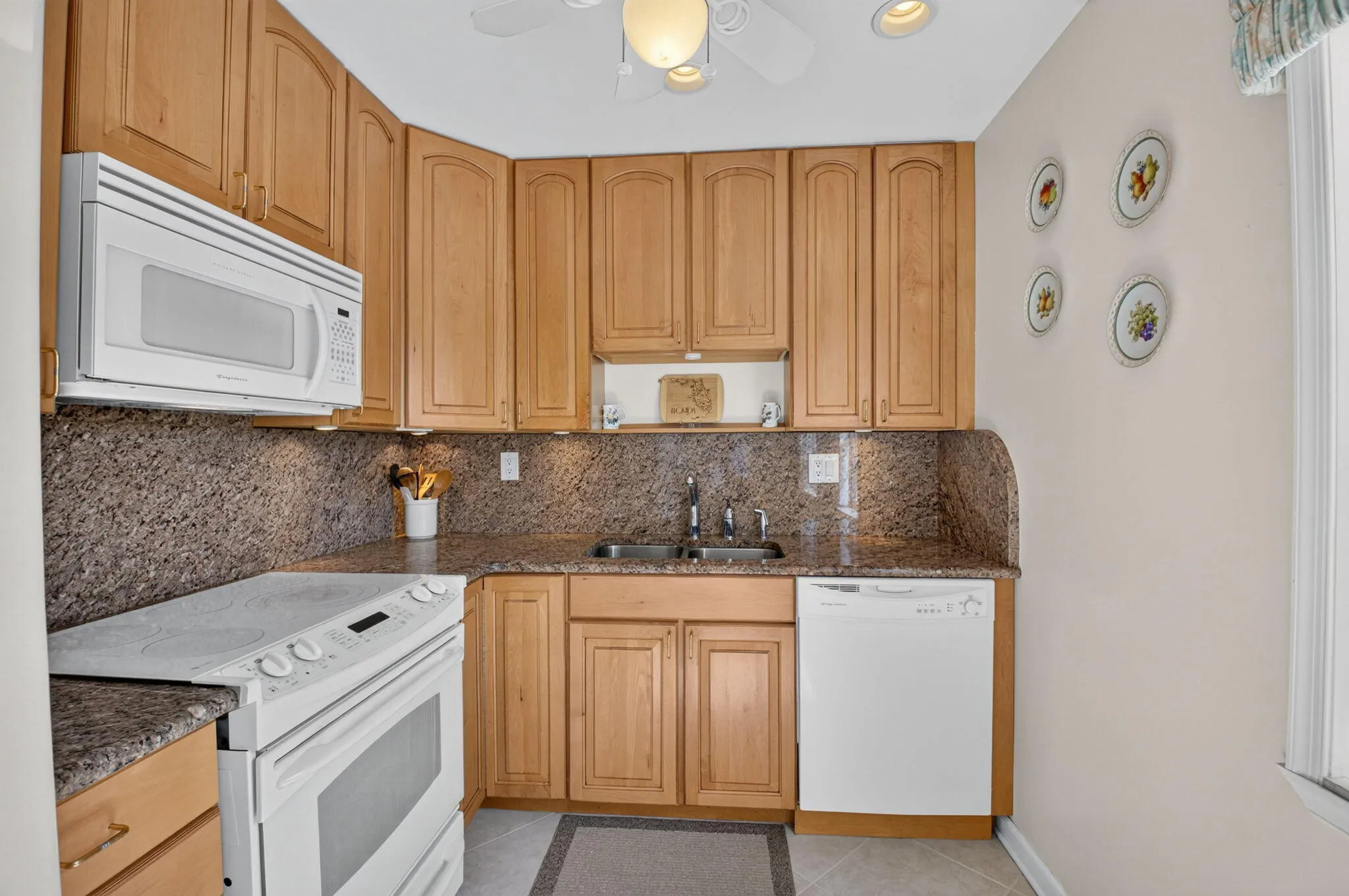 Ceiling- height cabinetry allows for maximum storage for avid home chefs!