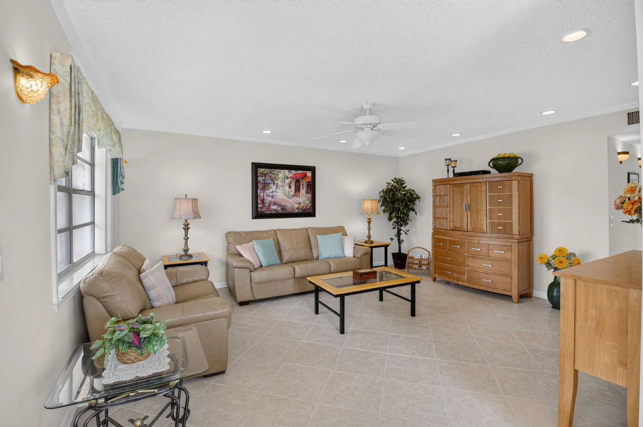 Save on your electric bill with all of the natural light in this beautiful condo!