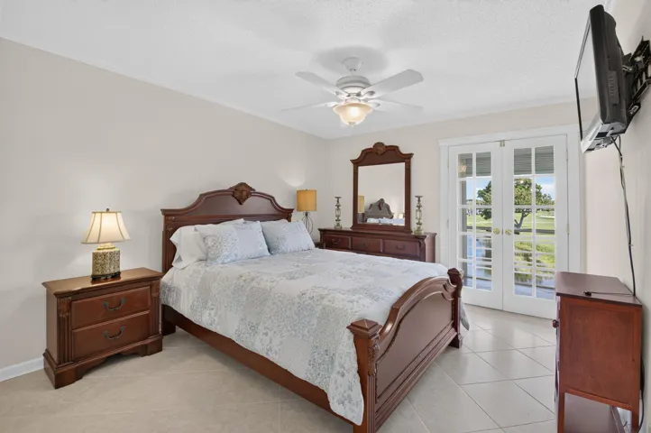 Primary suite features custom French doors to the spacious balcony!
