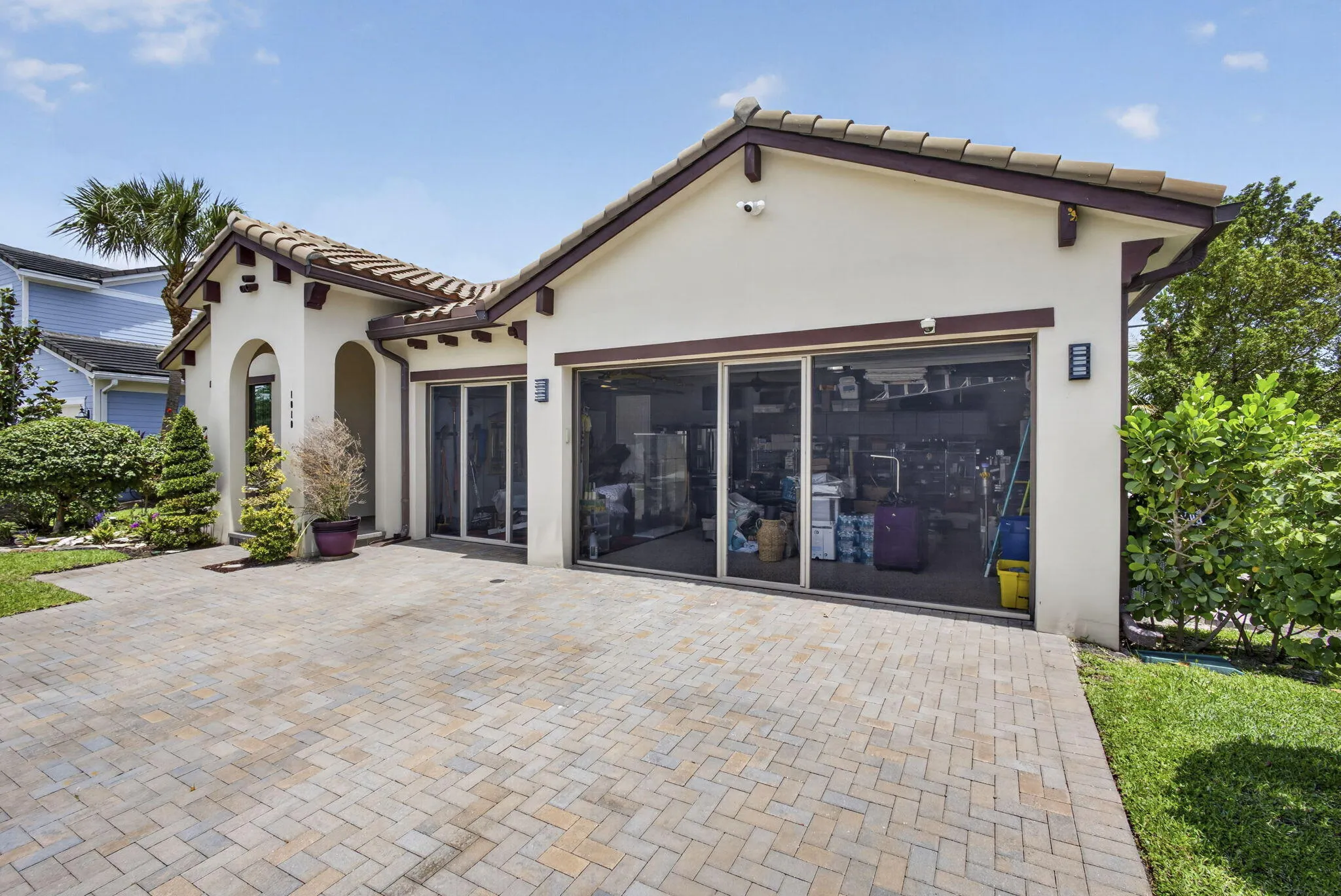 Screen doors over garage and AC
