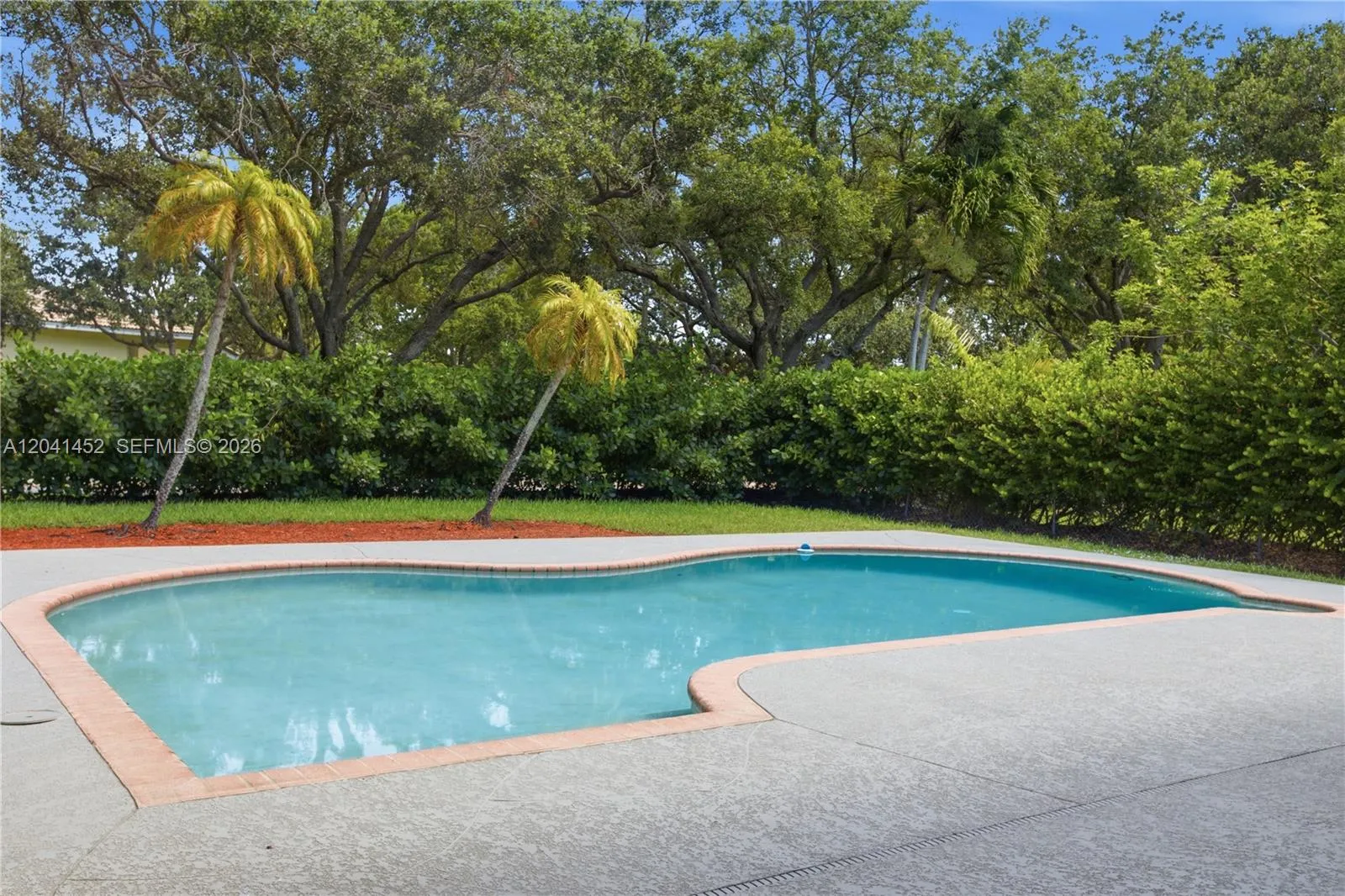 Open Pool is Surrounded by a Lush Privacy Hedge!