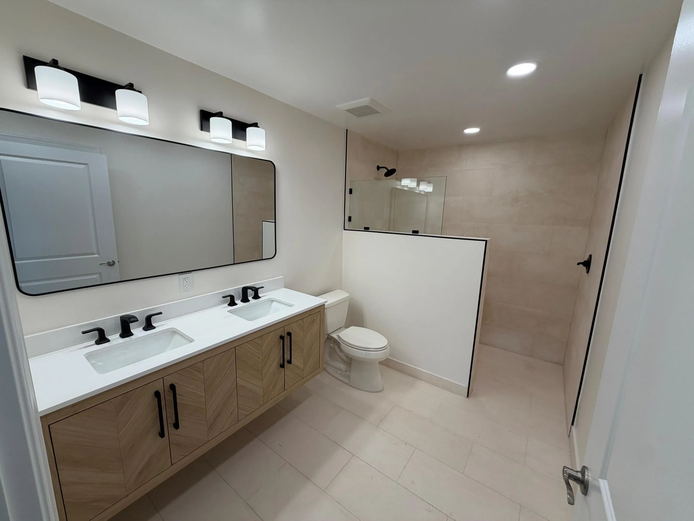 Master bathroom, double vanity, and tile work completed 2026.