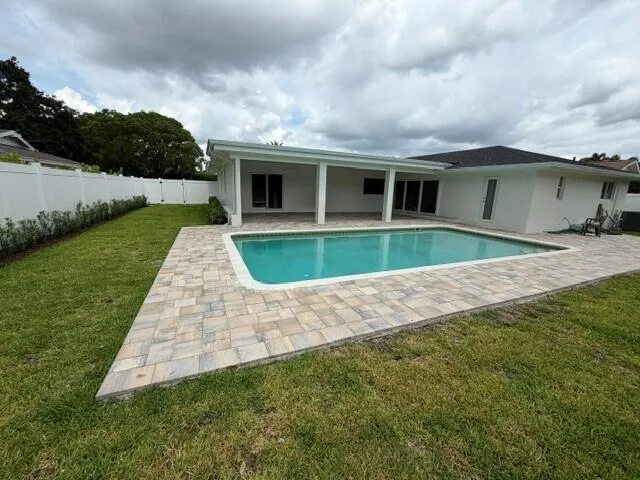 Pool view with brick pavers installed 2026.