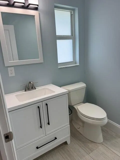 Cabana bathroom/ vanity/mirror/lighting/ fresh paint/flooring 2026 PGT hurricane window 2024.