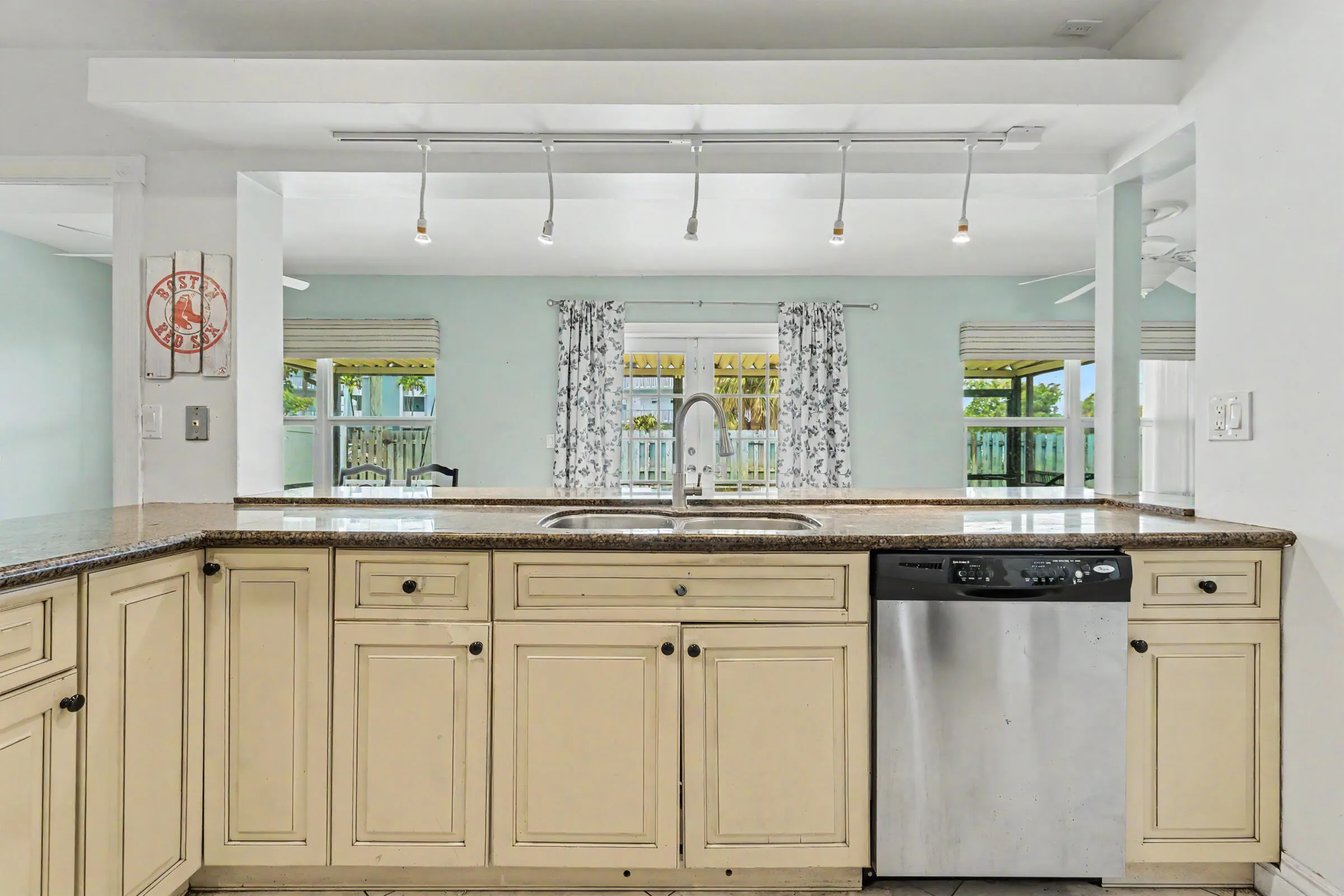 Kitchen is in the heart of the home with lots of granite counter space