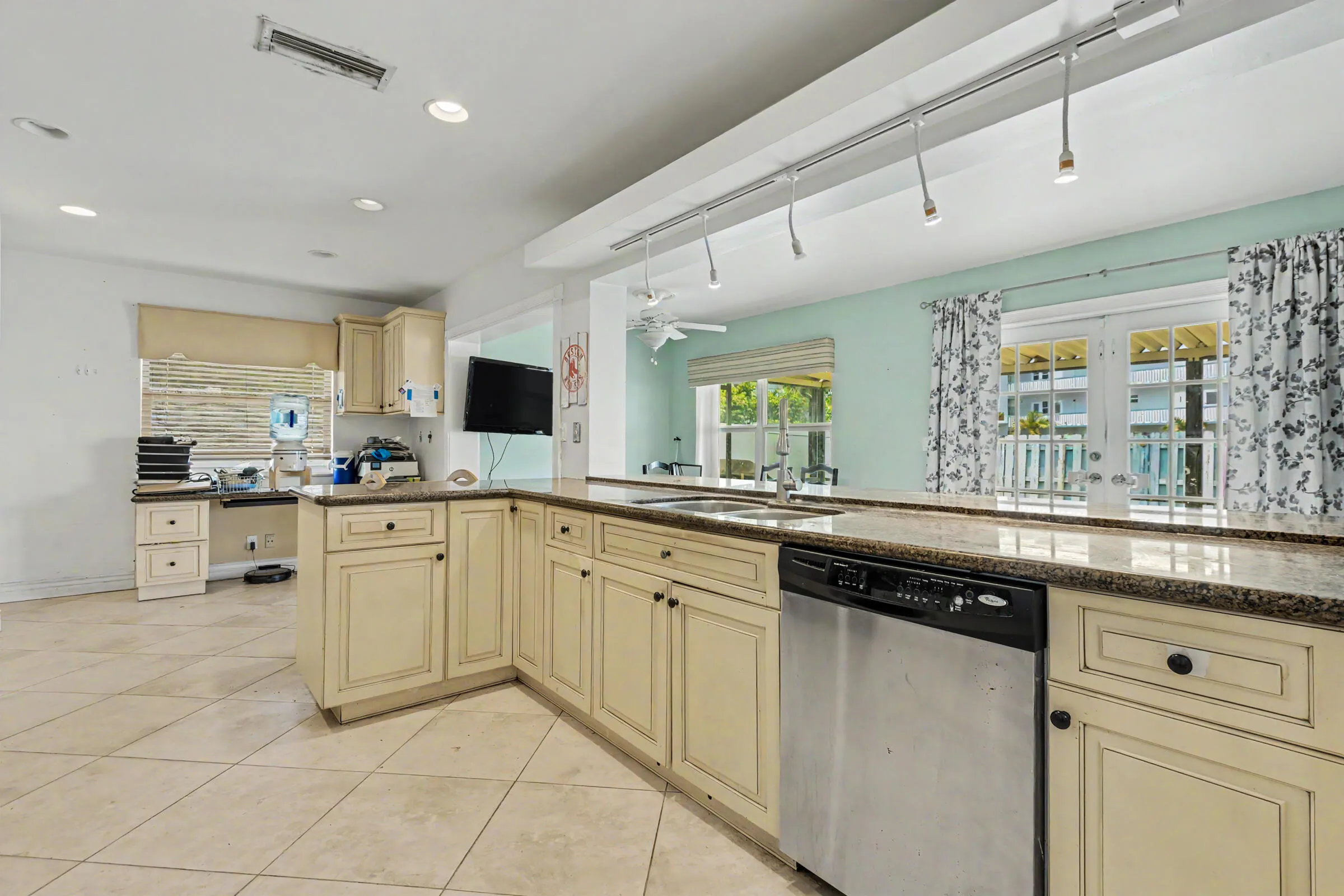 Kitchen is in the heart of the home with lots of granite counter space