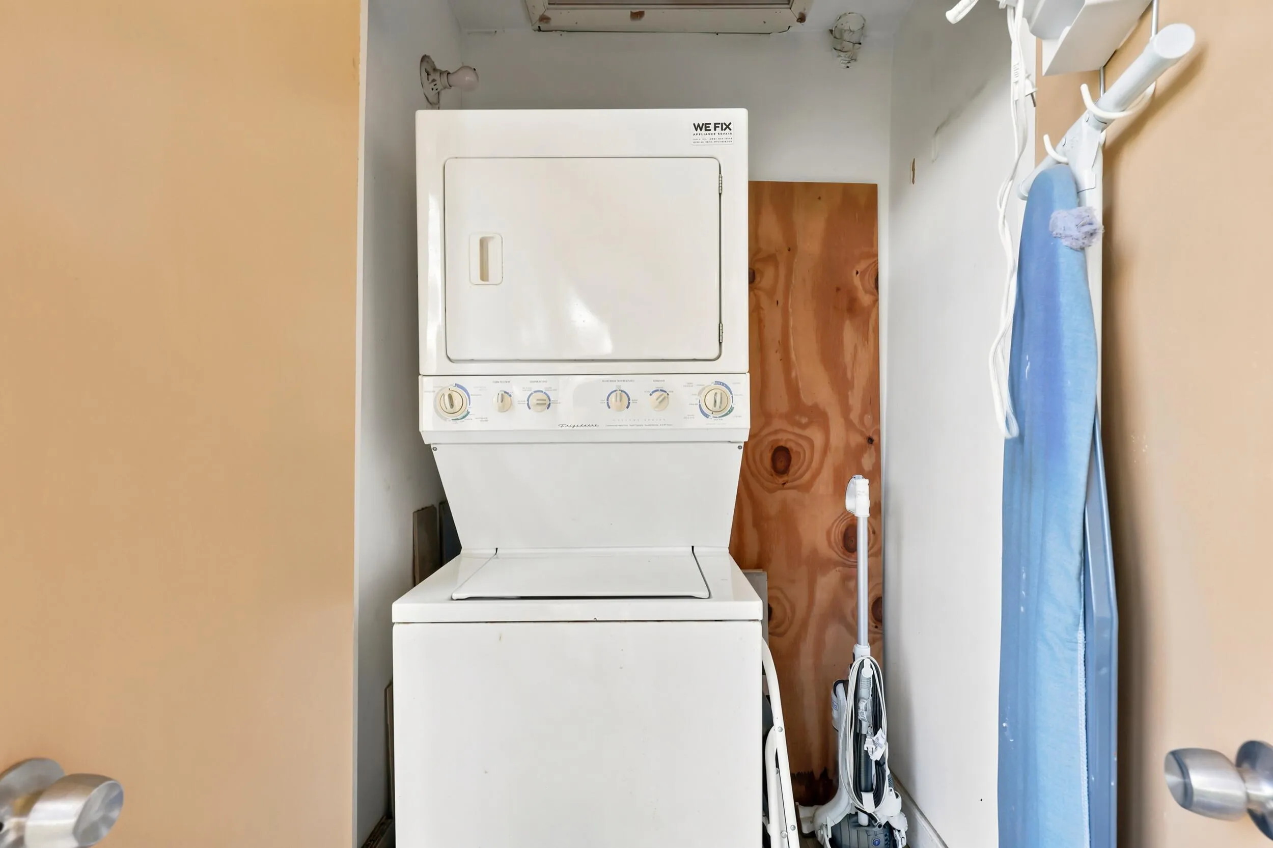 Enjoy the convenience of an in-unit laundry area featuring a full-size washer and dryer tucked neatly away in a dedicated closet. The space offers practical storage and easy access, making everyday household tasks simple and efficient.