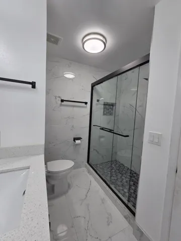 10477