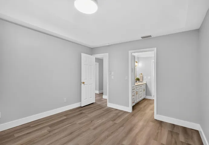VIEW OF VANITY AREA FROM MASTER BEDROOM