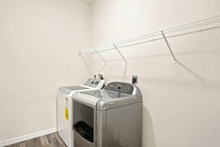 Large laundry room located off the kitchen and off the garage
