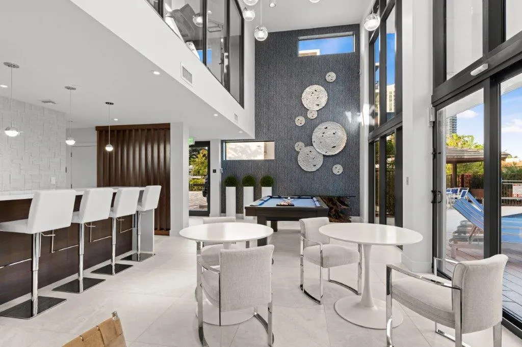 2-story Clubhouse offers fitness, billiards, wet bar, catering kitchen, lounge area & property manger office