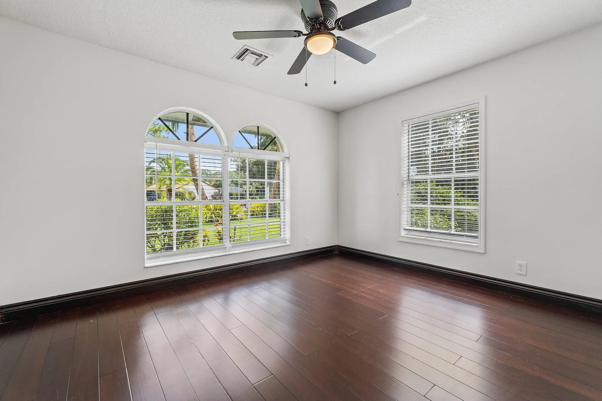 Bedroom with arched windows