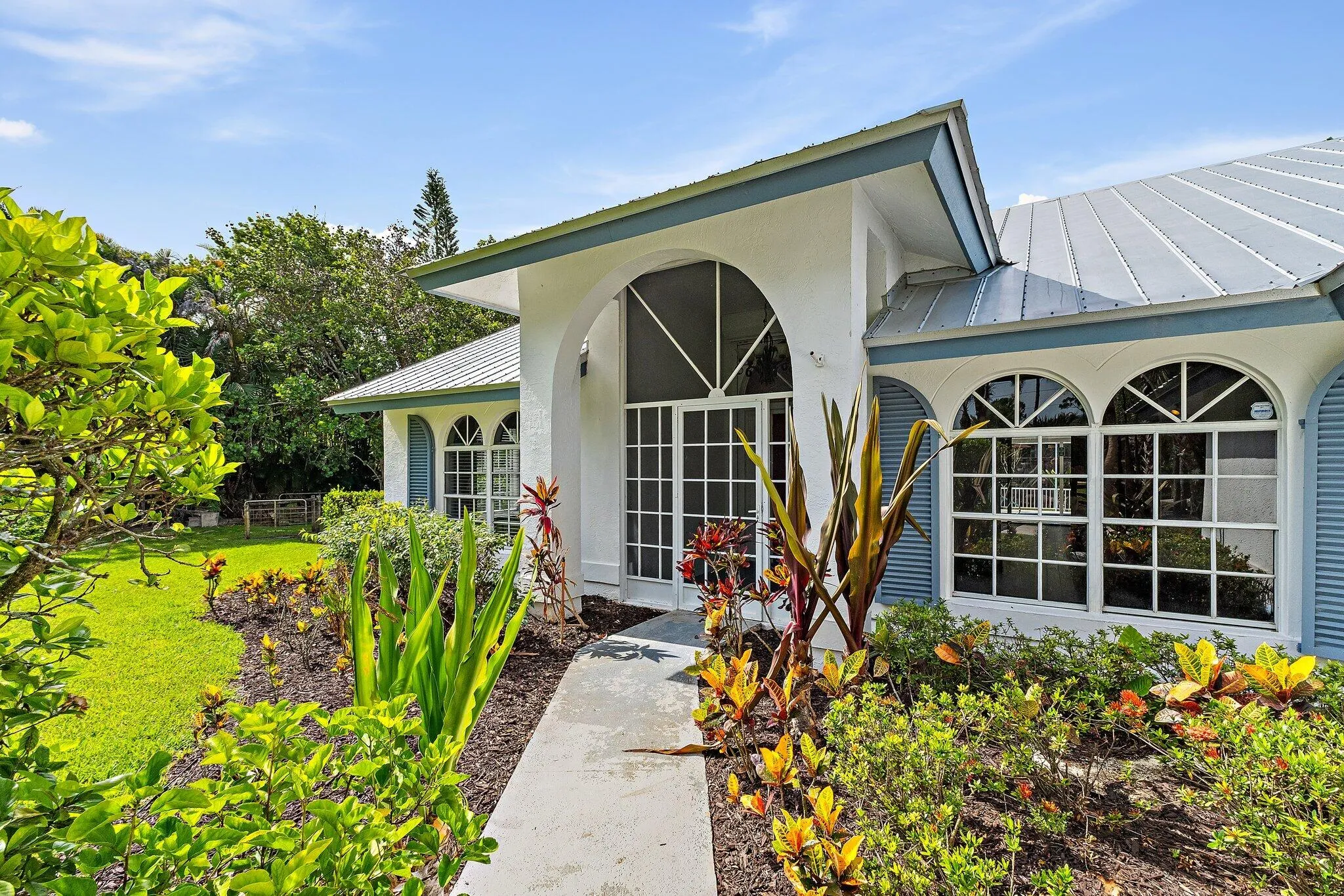 Front elevation with arched windows