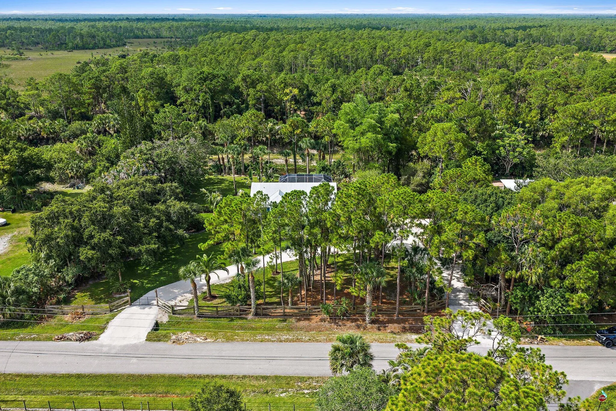 Aerial of the wooded acre lot