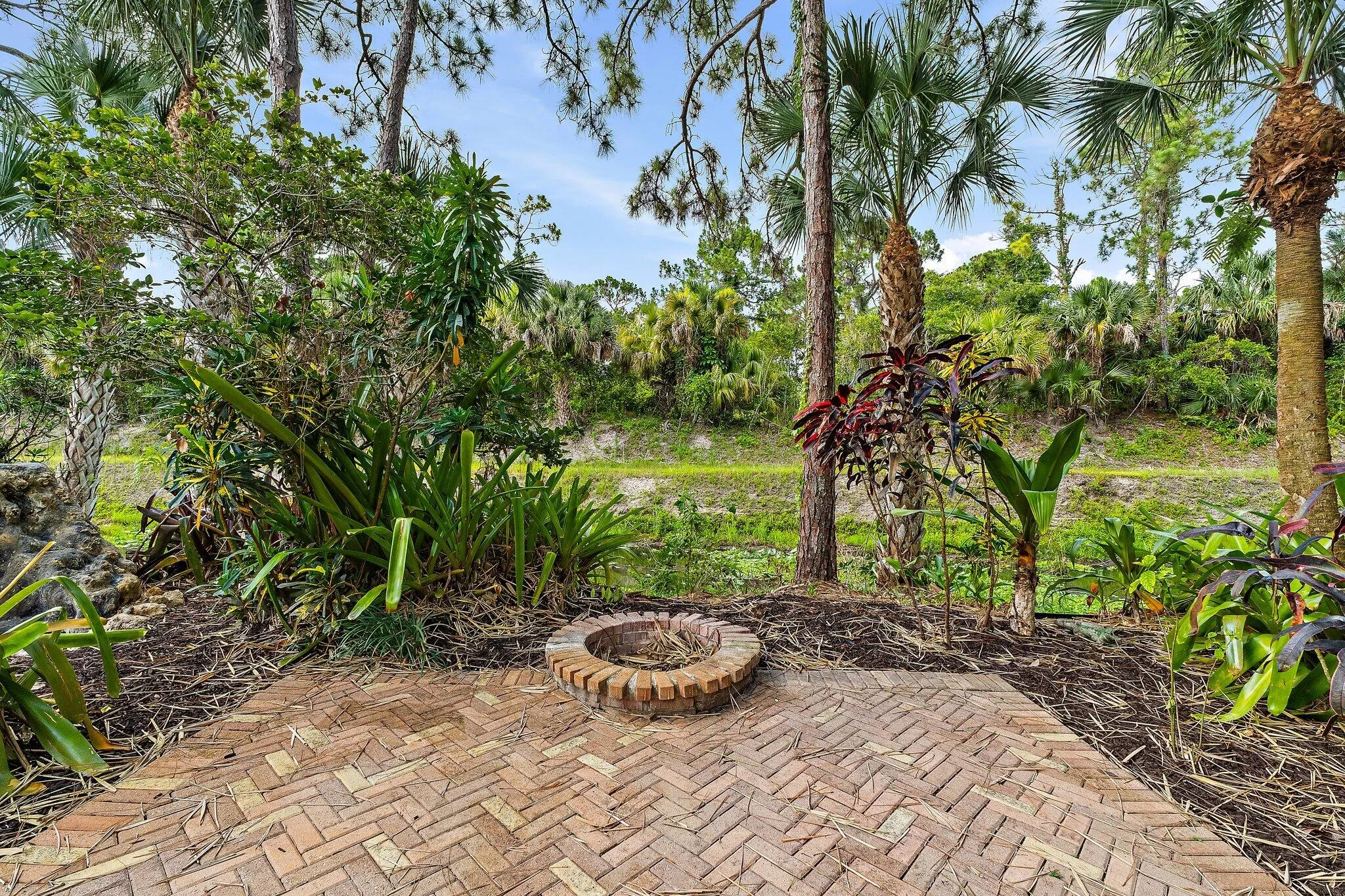 Backyard fire pit and paver patio