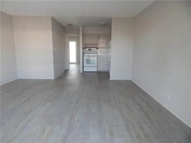 Open concept living room/ dining/kitchen