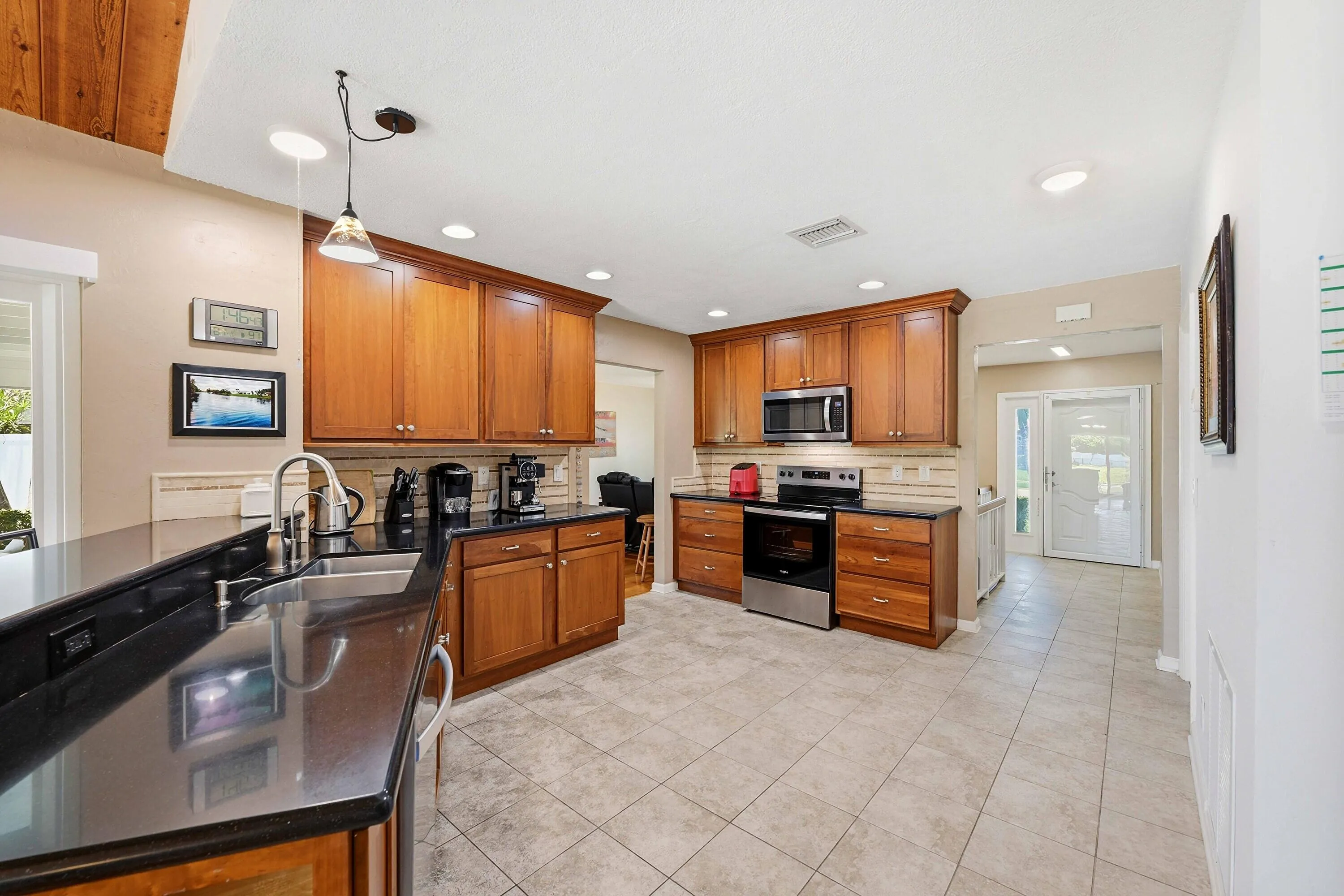Kitchen - Cedar Cabinets, Black Granite, New SS Appliances. iSpring 4 stage RO water filtration system.