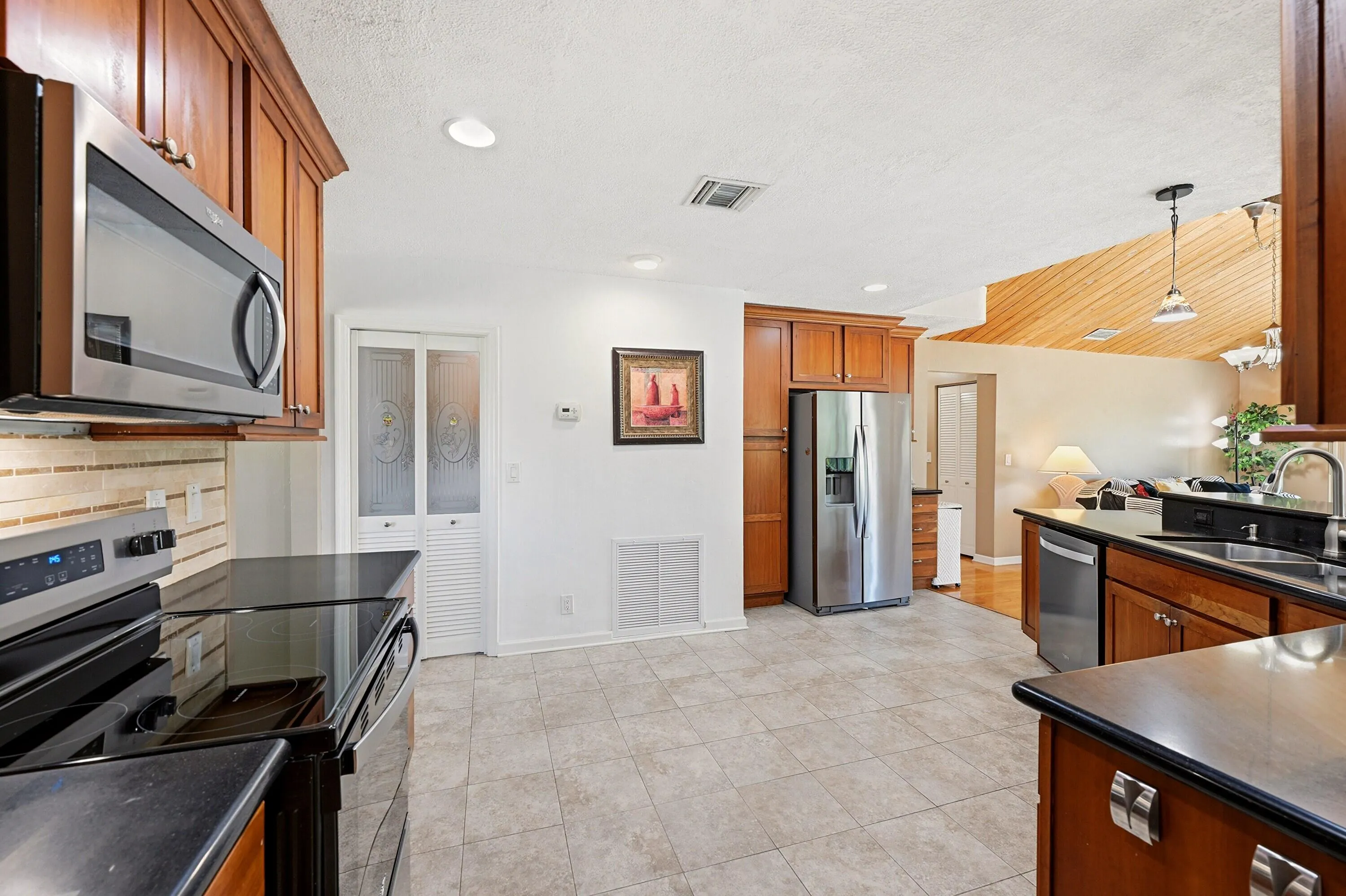Kitchen - Cedar Cabinets, Black Granite, New SS Appliances