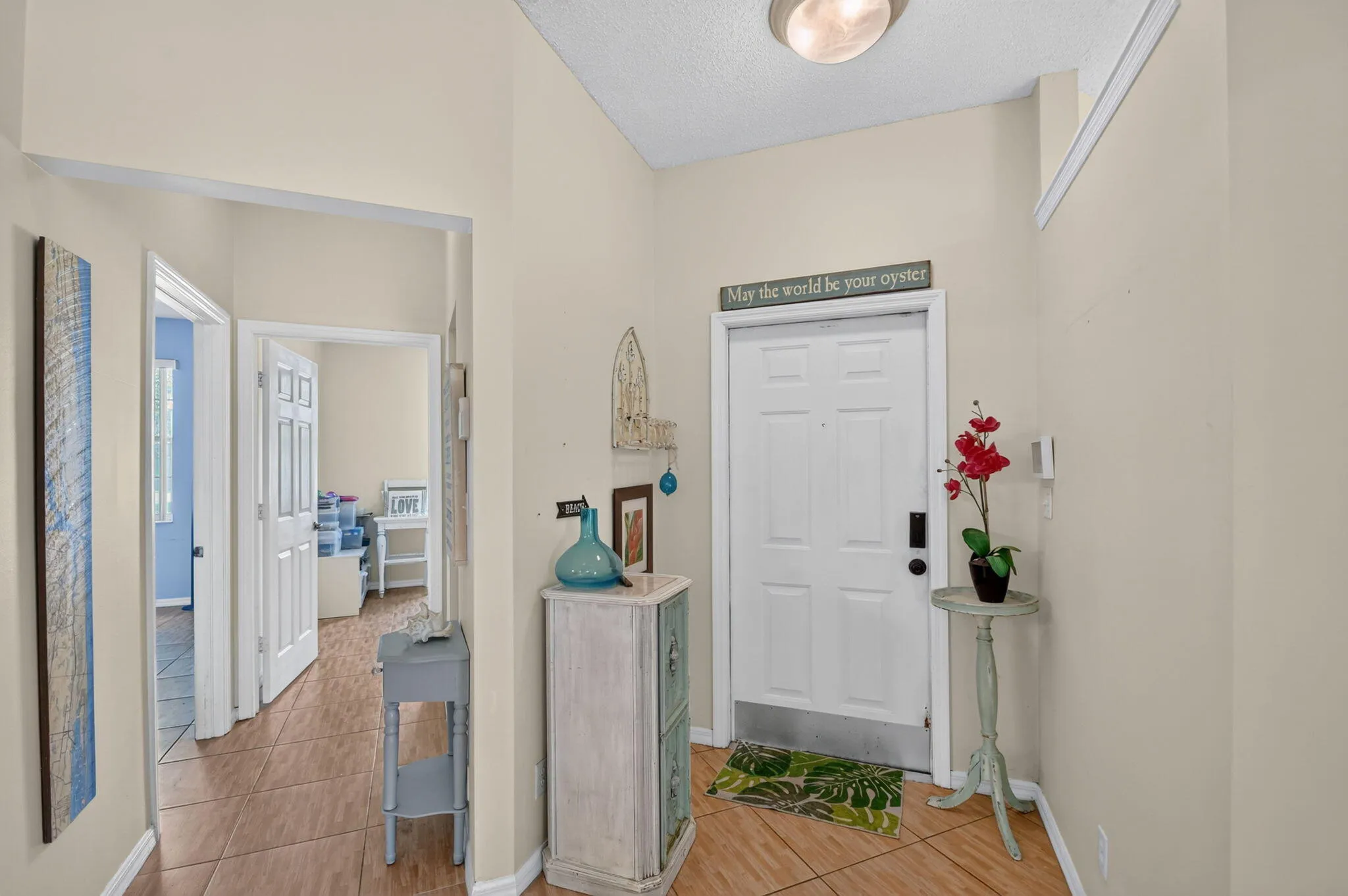 View facing entryway and extra rooms