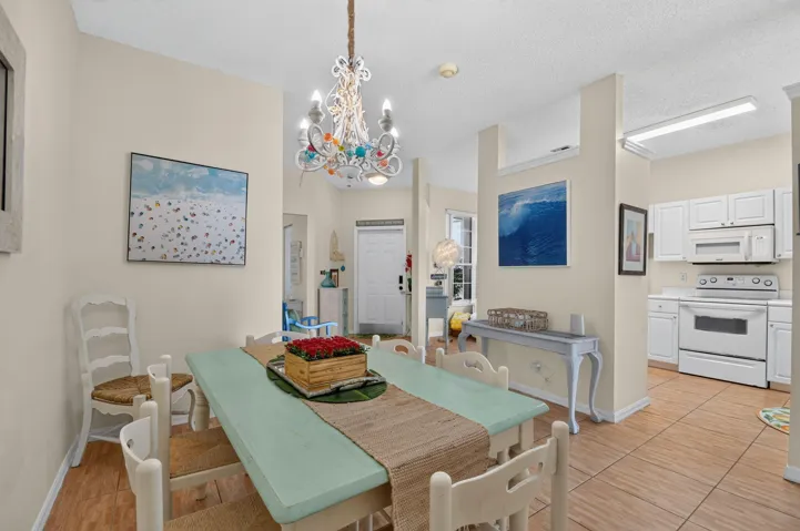 Dining, facing kitchen and front door