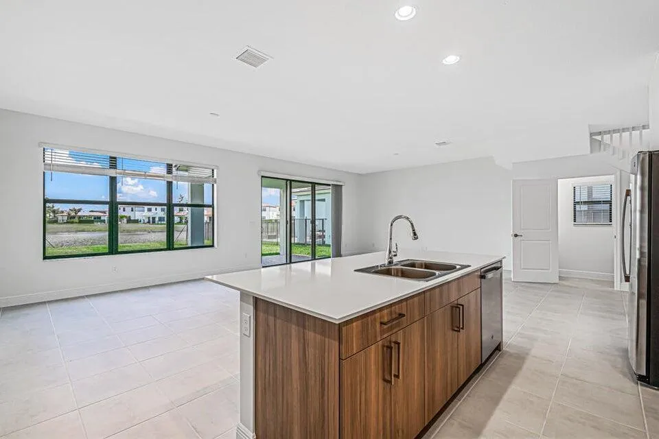 Quartz island overlooks living area