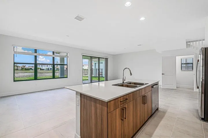 Quartz island overlooks living area