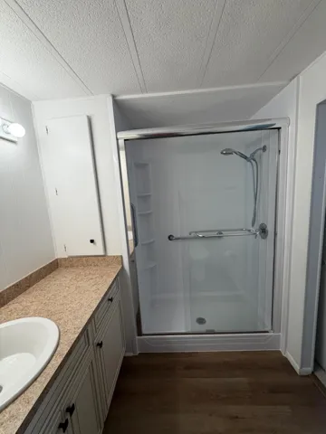 The owners suite newer walk in shower.