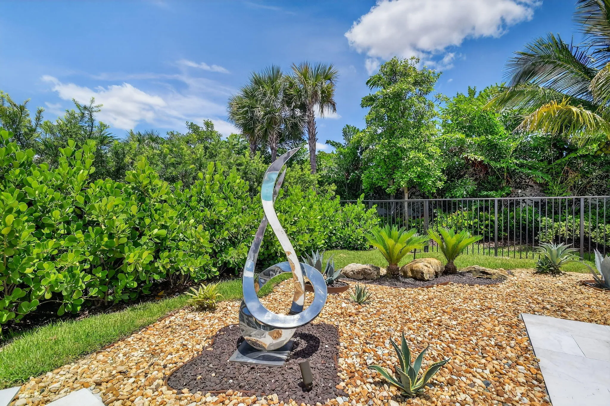 Renowned Artist Sculpture Not Included but available for separate purchase.