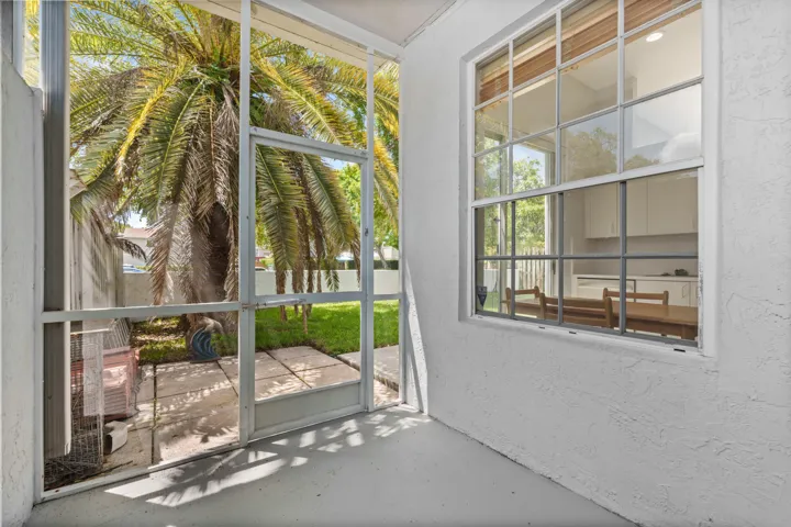 Screened patio with solid roof
