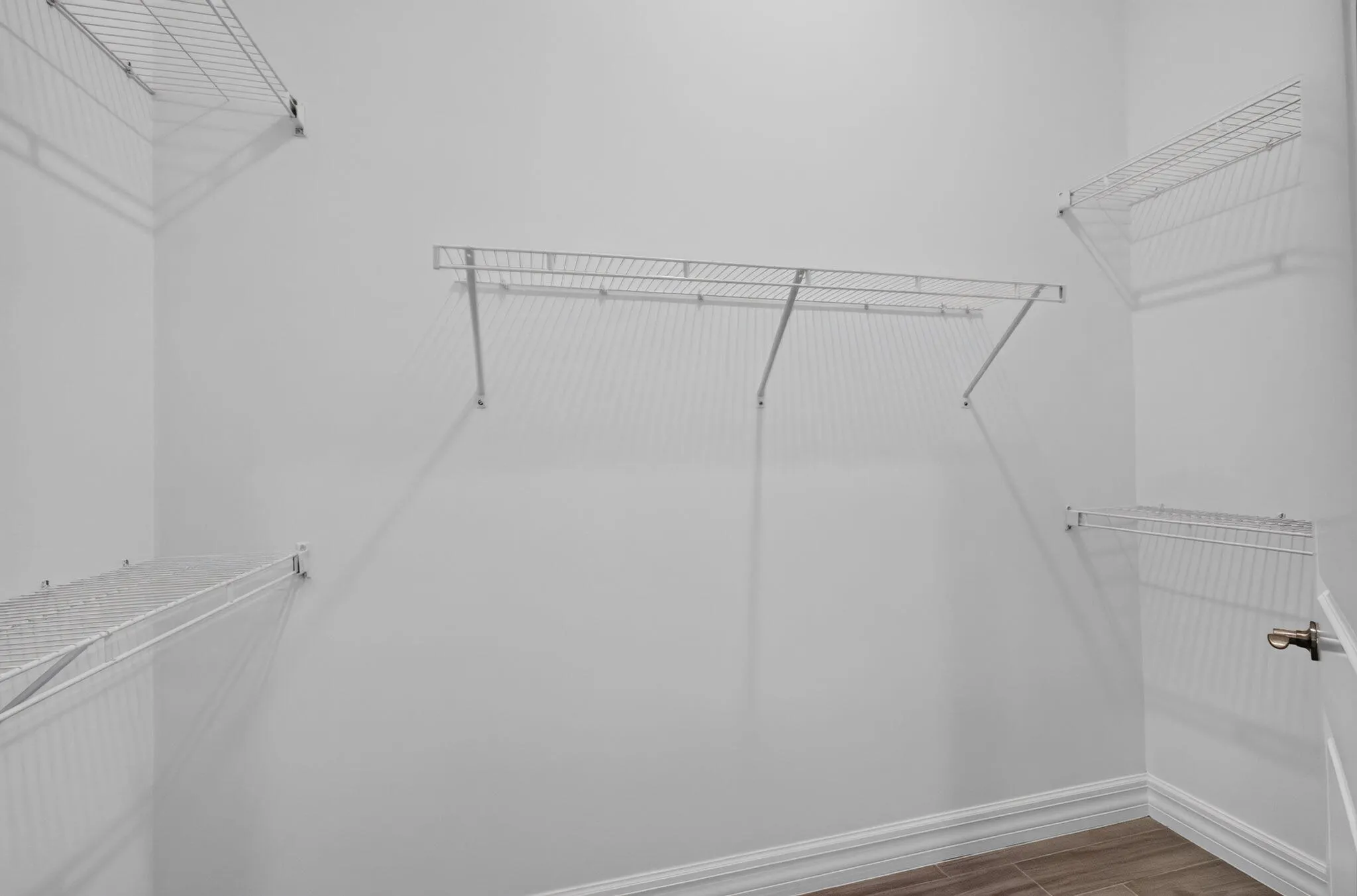Spacious primary suite walk-in closet #1.