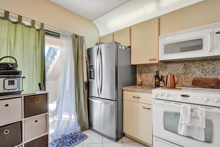 Kitchen w/Slider to Front Patio