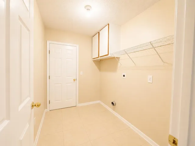 view of laundry room leading to garage